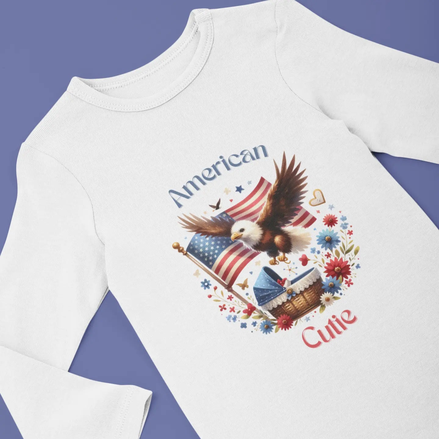 White long sleeve baby onesie with eagle and American flag, text "American Cutie" – perfect patriotic baby apparel.