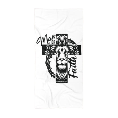 White beach towel featuring an image of a lion and a cross, with the text "Man of Faith" in black and white.