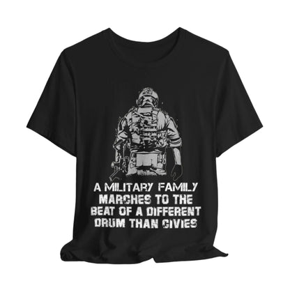 Black t-shirt featuring a soldier with the text 'Military family marches to a different drum' representing strength and pride.