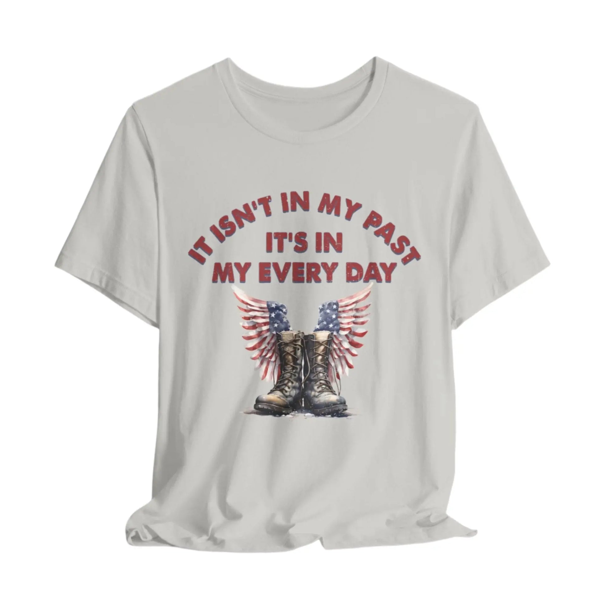 Silver t-shirt with combat boots and angel wings, text: "It isn't in my past, it's in my everyday" – PTSD Awareness shirt for veterans.