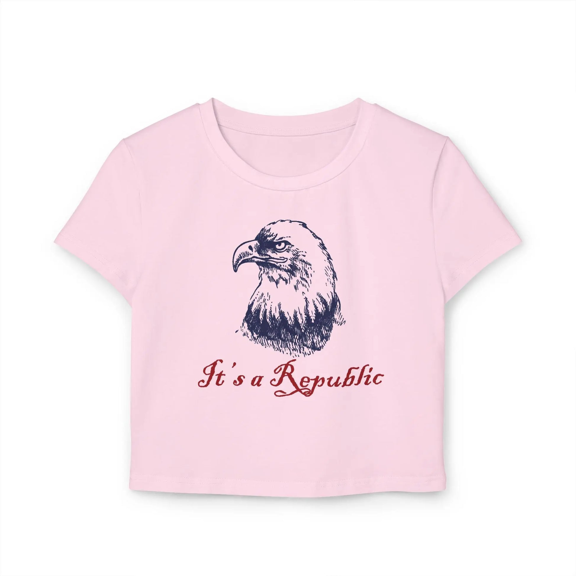 Pink baby tee crop top with eagle design and "It's A Republic" text.