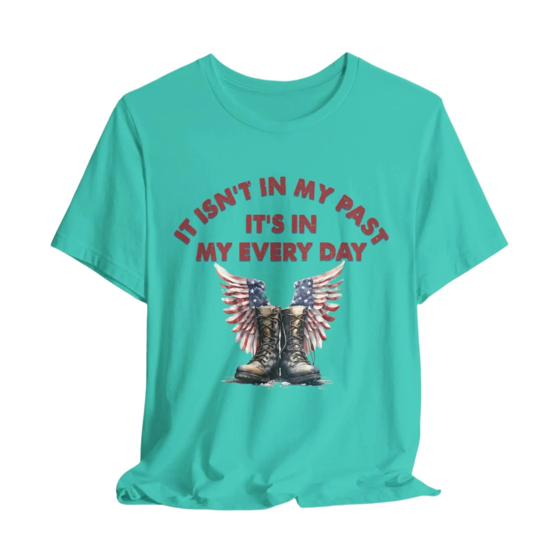 Teal t-shirt with combat boots and angel wings, text: "It isn't in my past, it's in my everyday" – PTSD Awareness shirt for veterans.