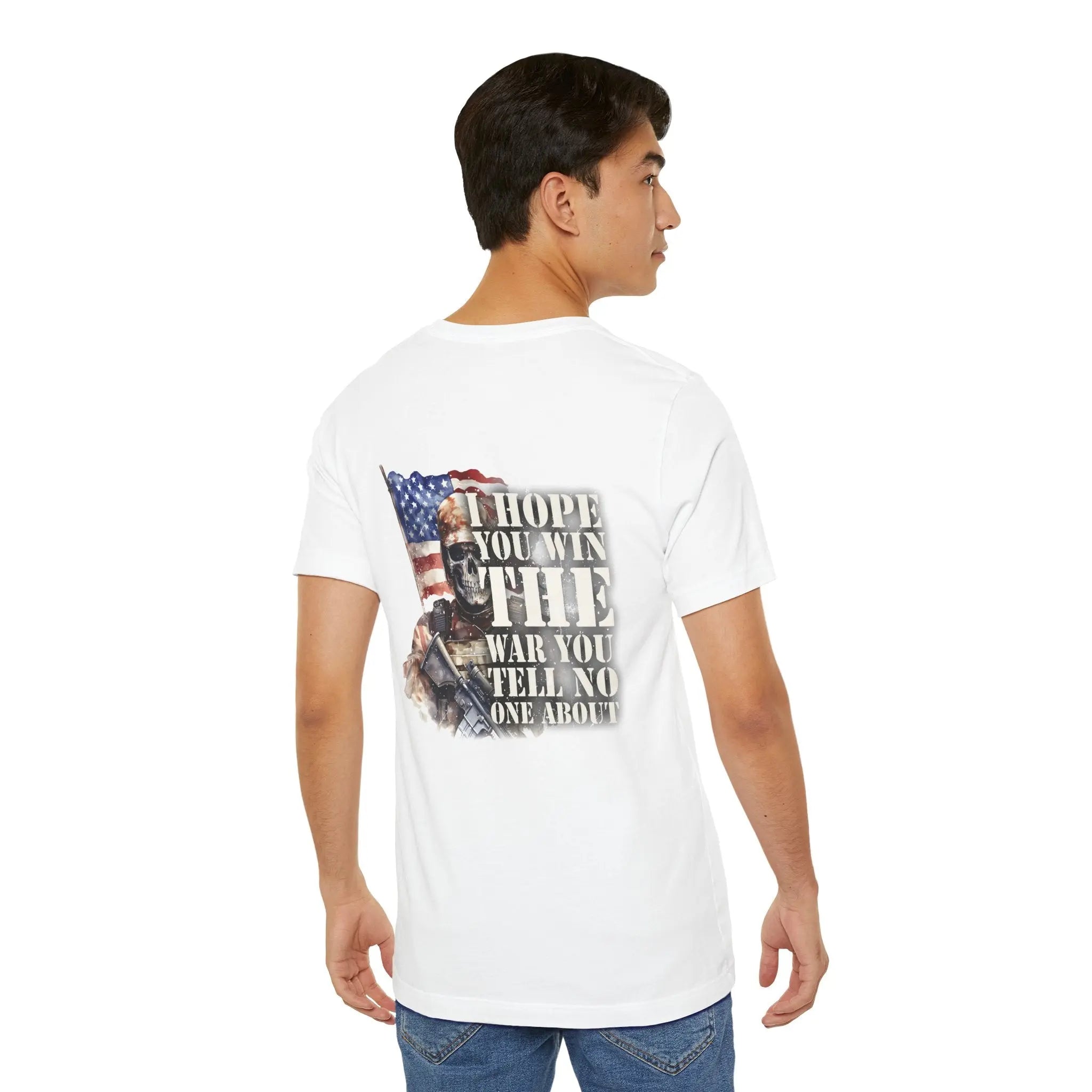 The back of a man wearing a white T-Shirt with a picture of an American flag and a military skeleton with the text I hope you win the war you tell no one about