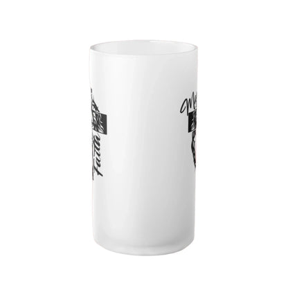 Sideview of a 16oz frosted glass mug with lion, cross, and 'Man of Faith' text in black and white.