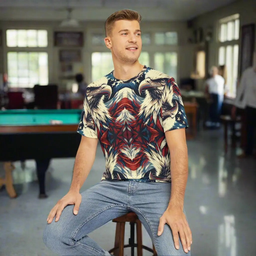 Man on stool wearing All Over Eagle Eye Design © Men's Tee - Envy The Eagle 