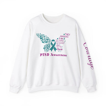 White She Is The Storm PTSD Awareness sweatshirt with butterfly design and 'Courage' print on the left arm. Empowering women’s empowerment tee.