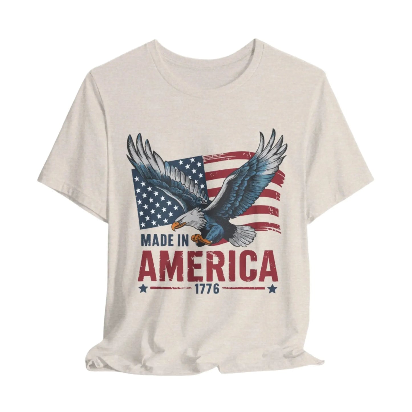 Heather Dust eagle and flag design on a t-shirt with the text 'Made in America 1776' symbolizing patriotism and freedom.