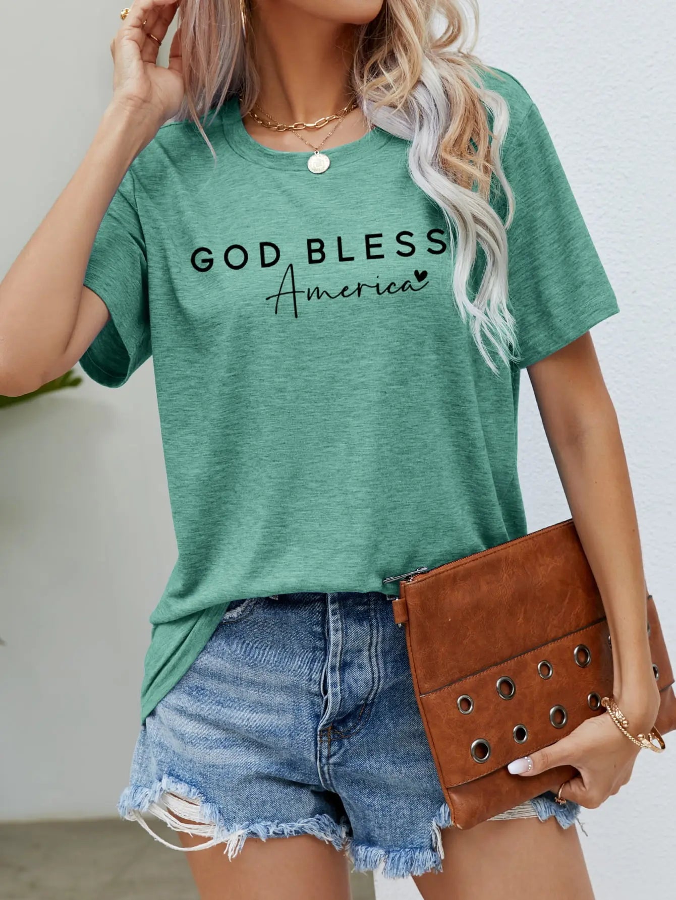 Gum Leaf God Bless America Graphic Short Sleeve Tee with bold patriotic design, breathable fabric, and a comfortable fit for stylish everyday wear.