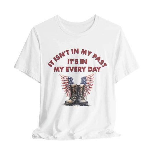 White t-shirt with combat boots and angel wings, text: "It isn't in my past, it's in my everyday" – PTSD Awareness shirt for veterans.