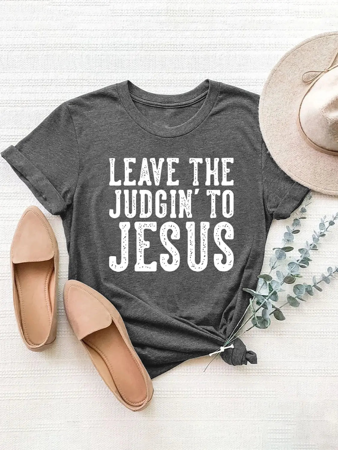 Flat lay Gray No Judgin Round Neck T-Shirt with 'Leave the Judging to Jesus' message, bold Christian faith tee.