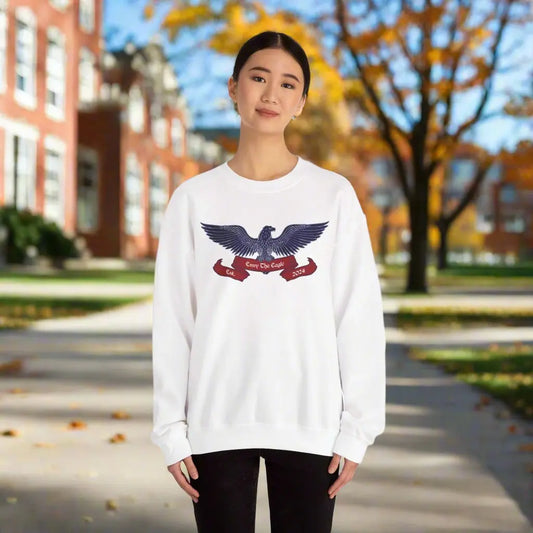 Girl wearing white sweatshirt image of embroidered Eagle Envy The Eagle™ logo. Patriotic symbol of freedom!