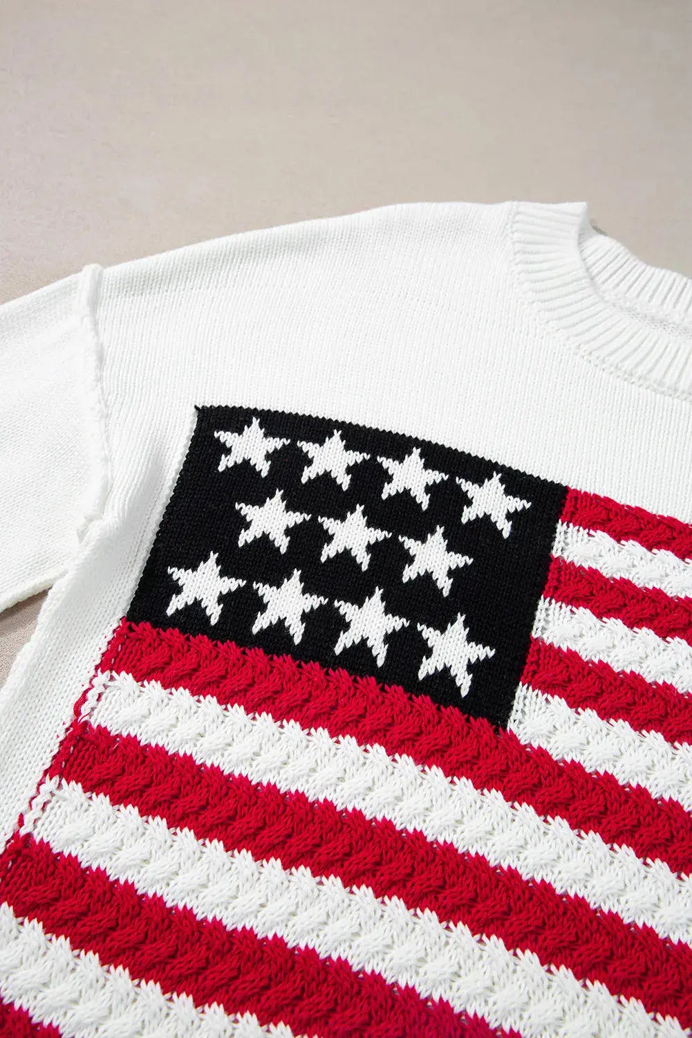 Close up US Flag Round Neck Long Sleeve Knit Top for women, featuring a bold patriotic design, soft knit fabric, and a classic flattering fit.