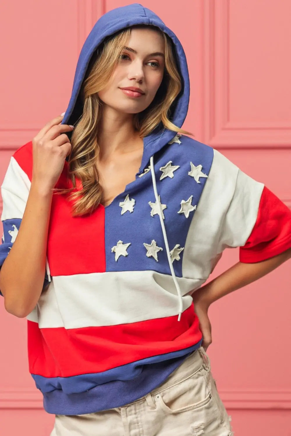 Lady wearing Forever America Flag Theme Hoodie, bold patriotic design, cozy fit, and durable fabric, perfect for showcasing your American pride.