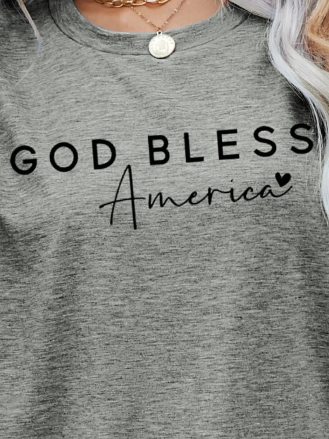 Close Up Gray Blush Pink God Bless America Graphic Short Sleeve Tee with bold patriotic design, breathable fabric, and a comfortable fit for stylish everyday wear.