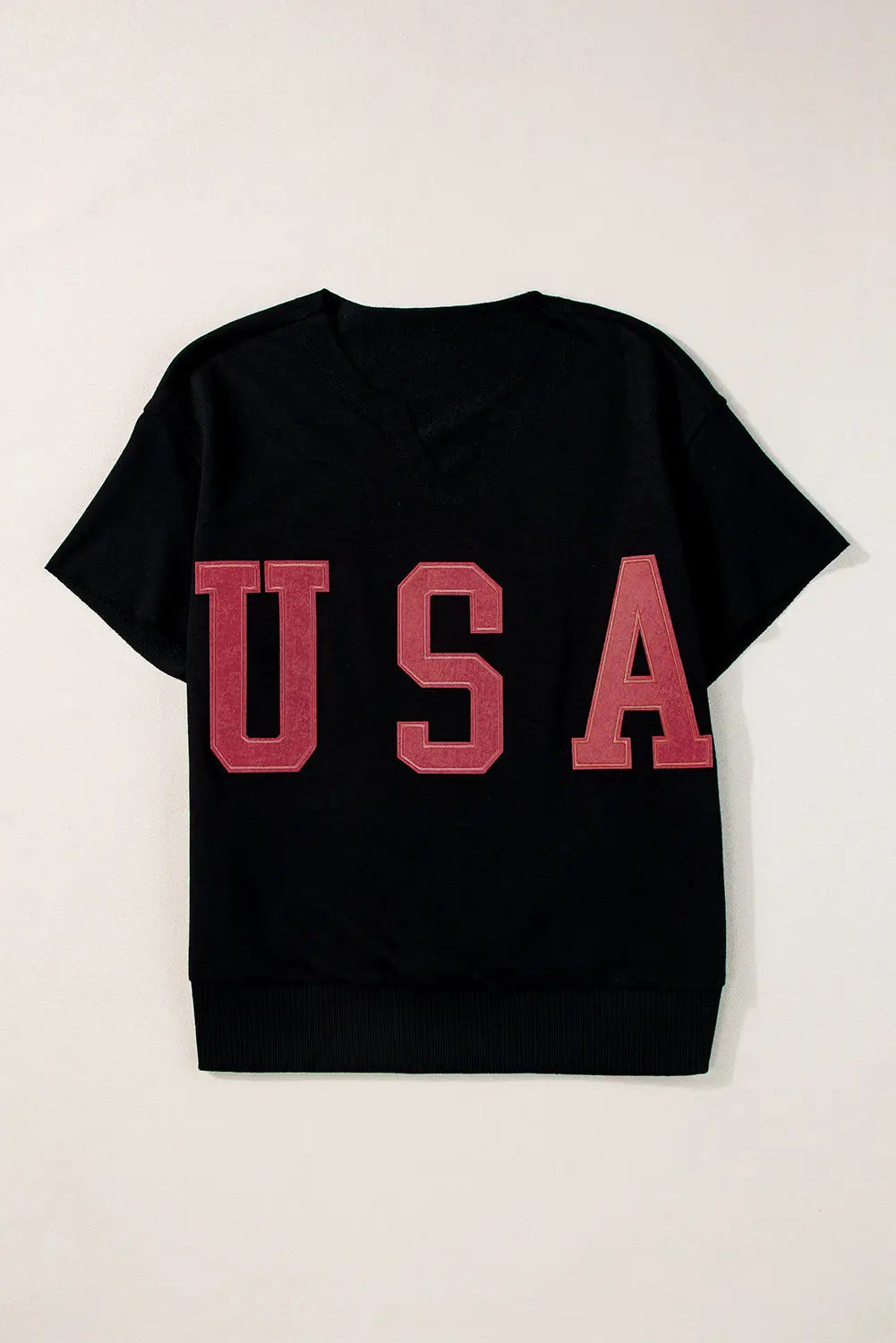 Black Top Notch USA Notched T-Shirt with unique neckline, soft fabric, and stylish patriotic design for casual comfort and bold flair.