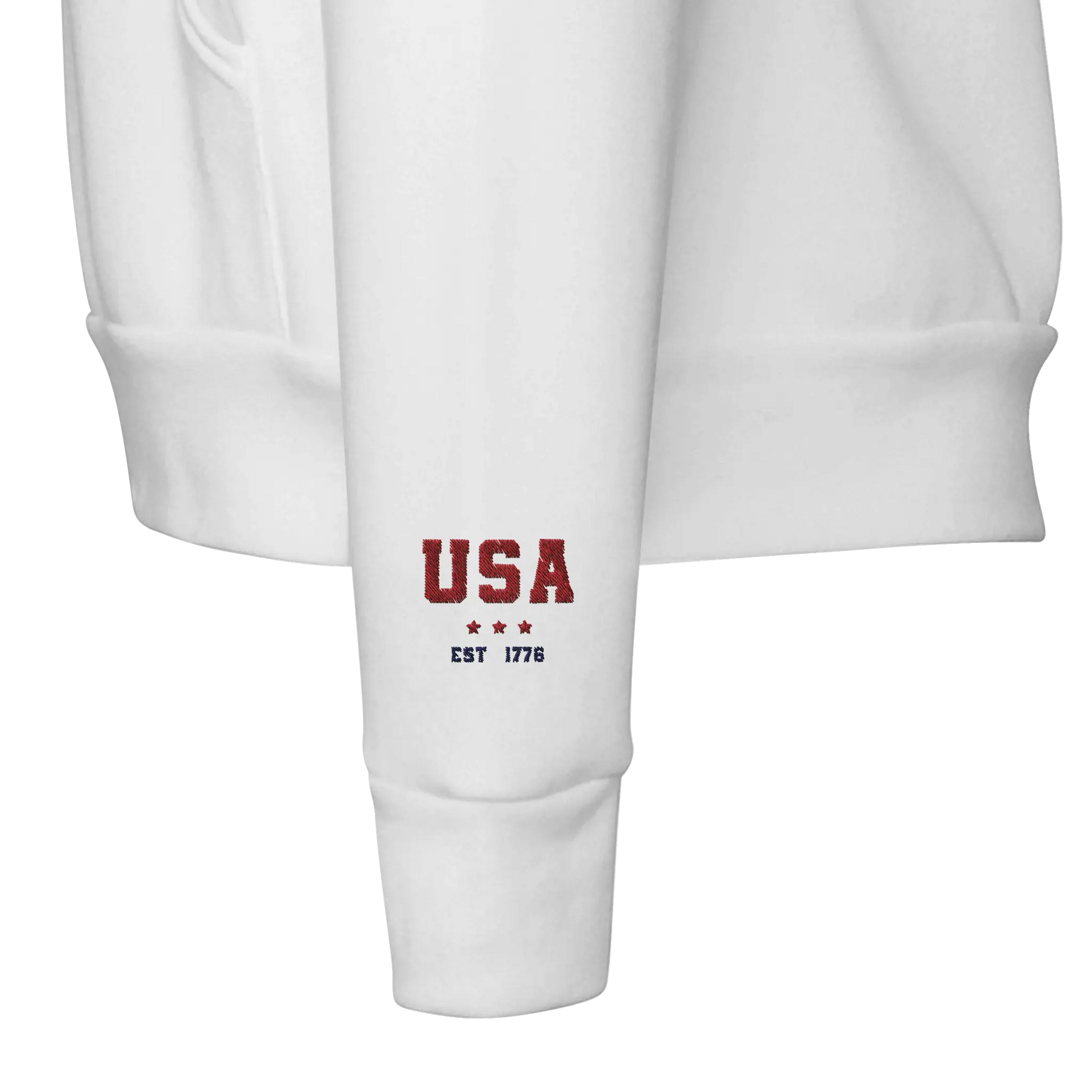 Left wrist white sweatshirt embroidered text USA EST 1776 with 3 stars. American Pride